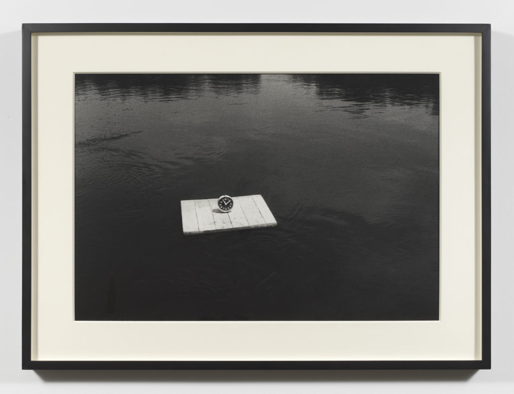 Framed photograph of raft in water