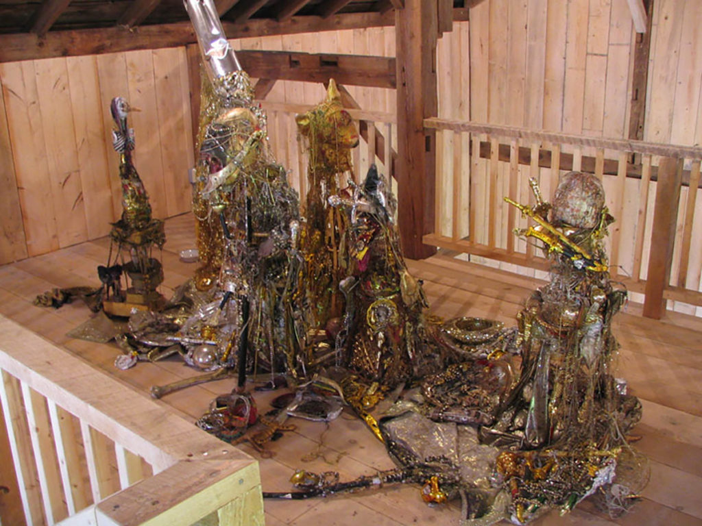 sculptures inside barn