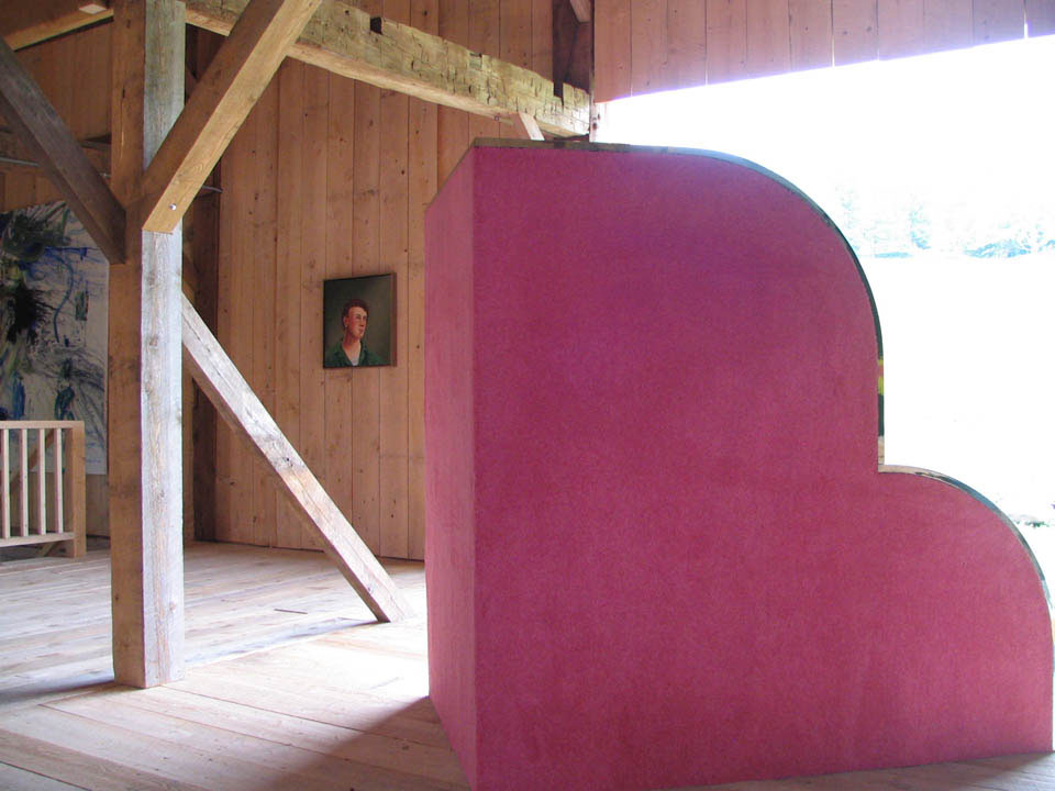 pink sculpture inside barn