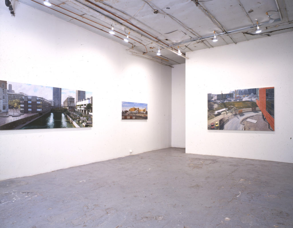Large photographs of cities in gallery