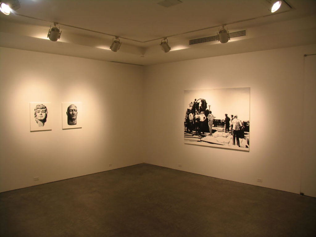 Black and white portraits in gallery
