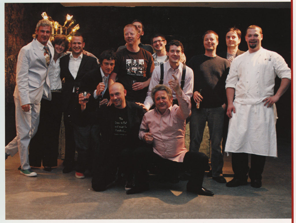Chefs and others in a group portrait