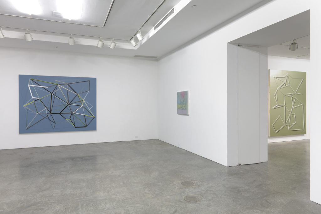 geometric paintings in gallery
