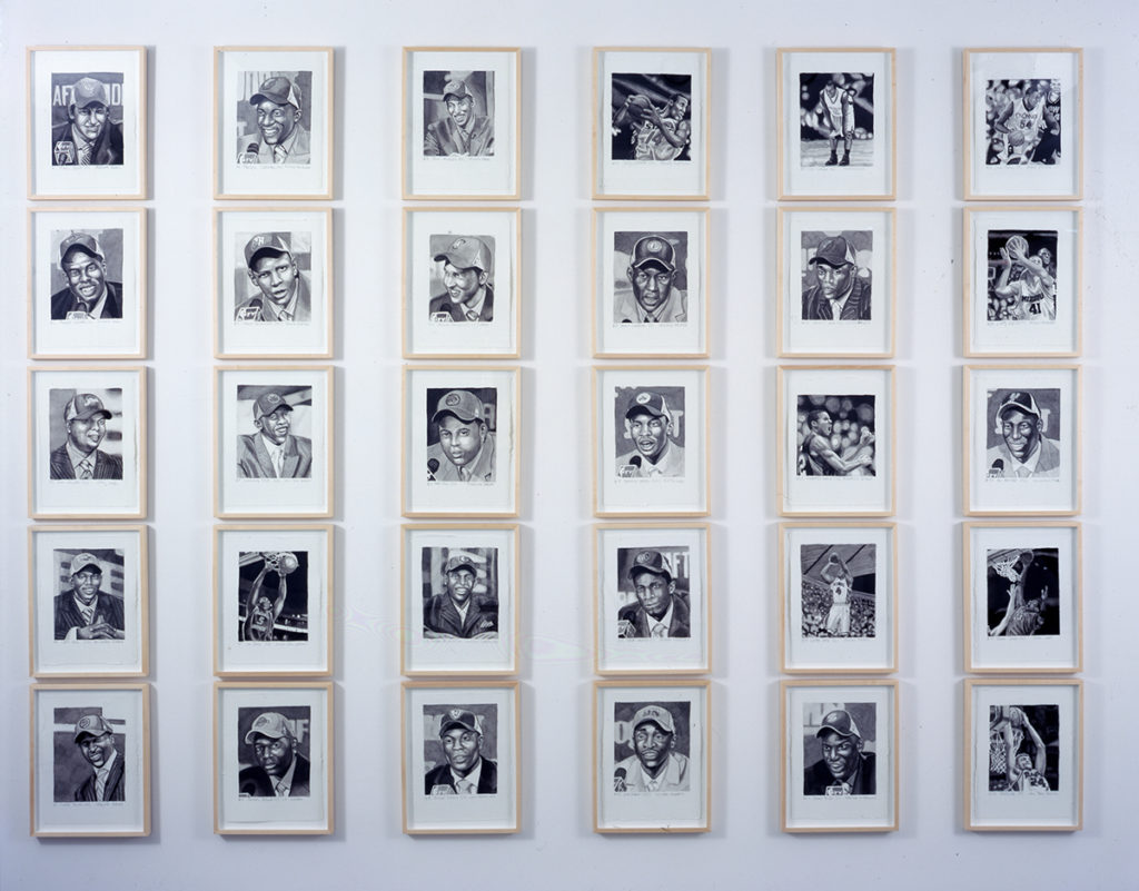 36 black and white portraits framed