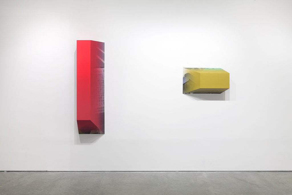 geometric wall sculptures in gallery