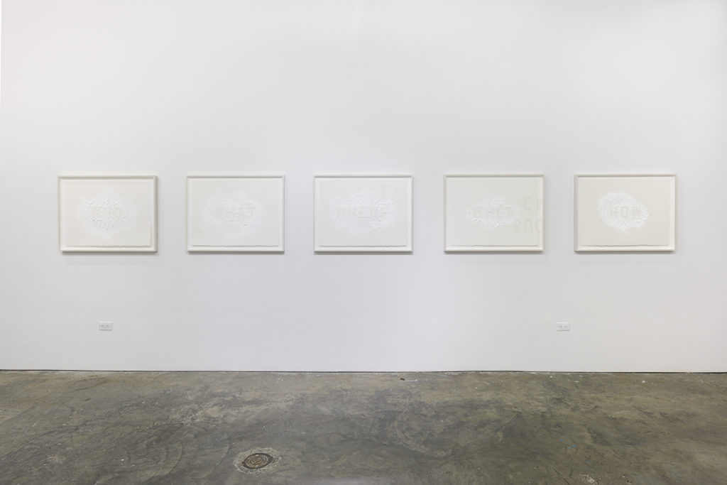white paintings in a gallery