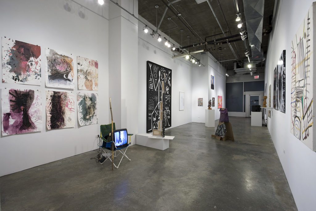 paintings and sculptures in gallery