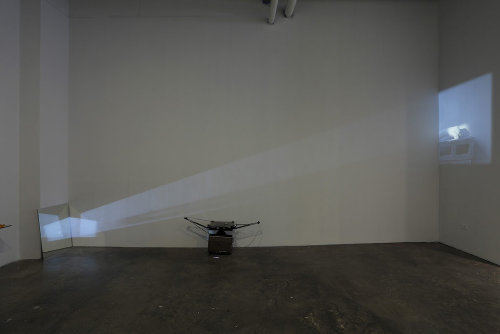 projector projecting a video in a gallery