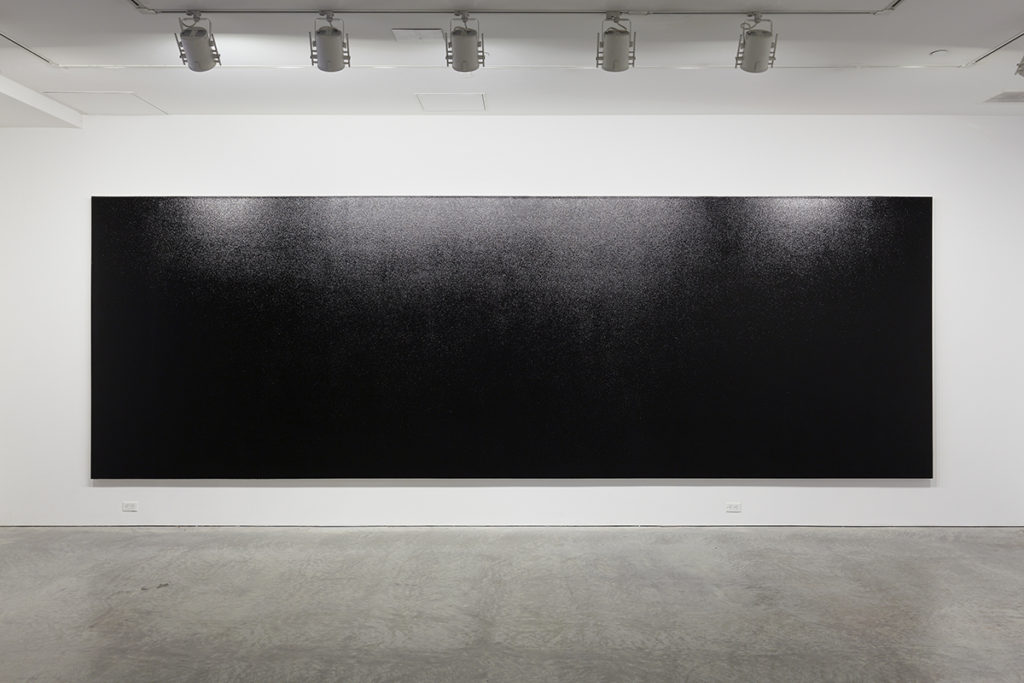 large black painting a gallery
